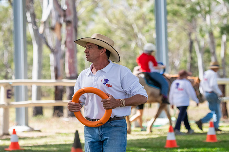 Man in cowboy hat outdoors