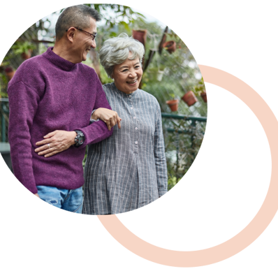 Happy affectionate senior couple walking together