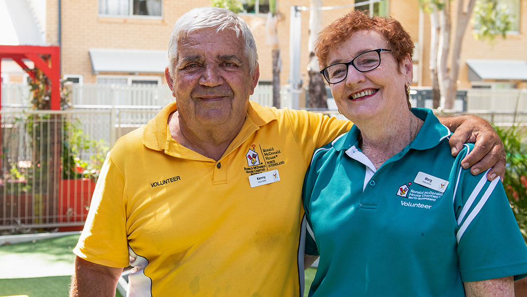 Man and woman smiling to camera