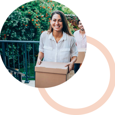 Young woman carrying box