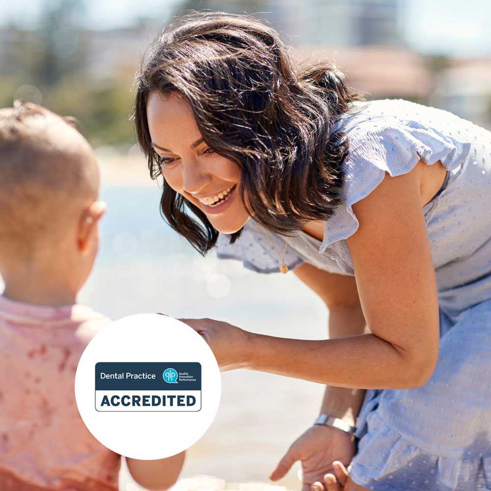 Smiling woman with child