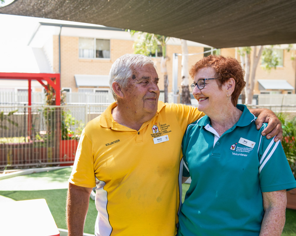 Man and woman smiling at each other